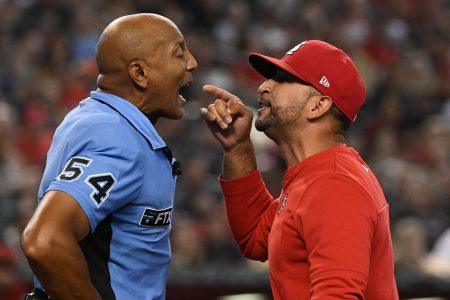Oliver Marmol of the Cardinals argues with umpire CB Bucknor in 2022.