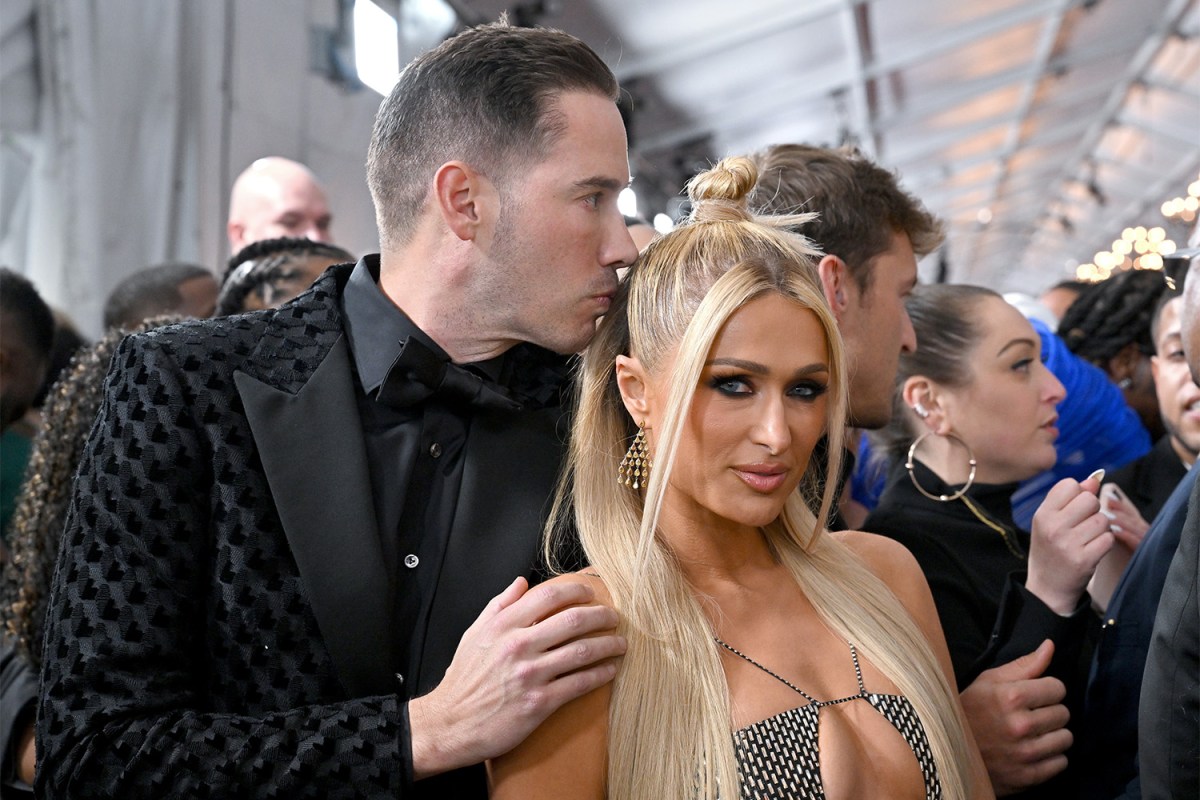 Carter Reum and Paris Hilton attend the 65th GRAMMY Awards at Crypto.com Arena on February 05, 2023 in Los Angeles, California.