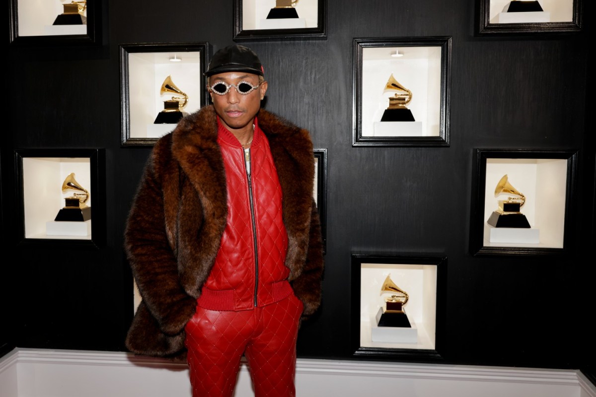 Pharrell Williams in a red outfit