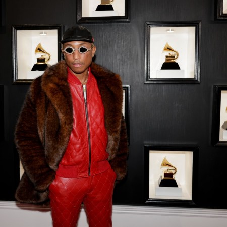 Pharrell Williams in a red outfit