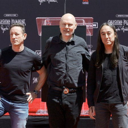 (L-R) Jimmy Chamberlin, Billy Corgan and Jeff Schroeder of the Smashing Pumpkins are honored with a Hand and Footprint Ceremony at TCL Chinese Theatre on May 11, 2022.