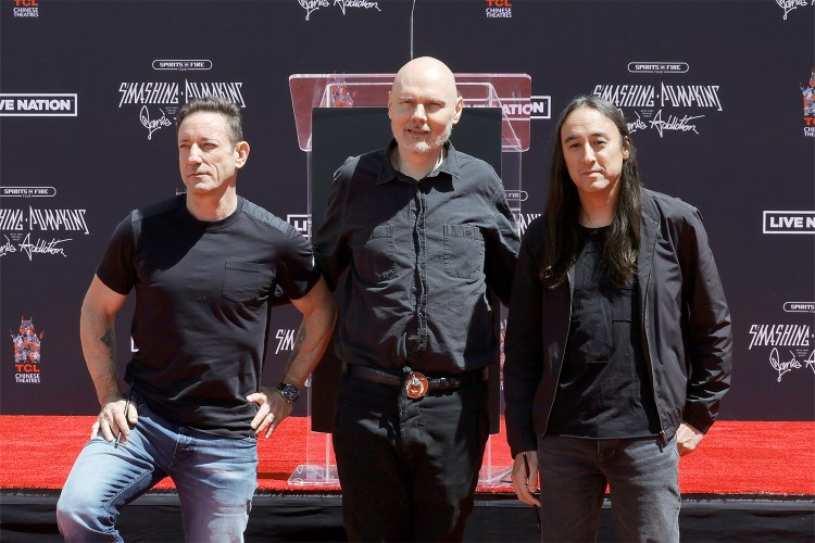 (L-R) Jimmy Chamberlin, Billy Corgan and Jeff Schroeder of the Smashing Pumpkins are honored with a Hand and Footprint Ceremony at TCL Chinese Theatre on May 11, 2022.