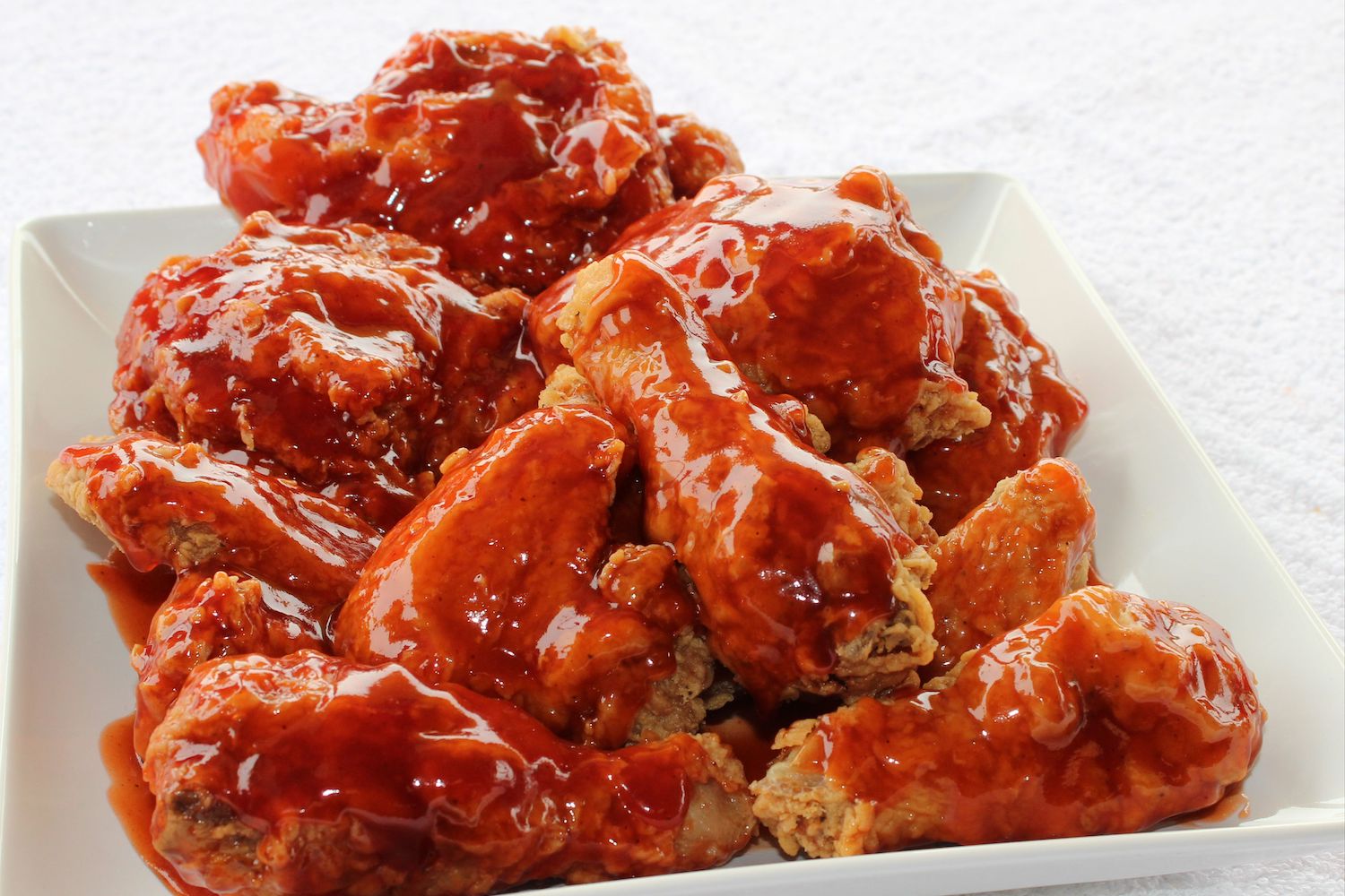 https://www.insidehook.com/wp-content/uploads/2023/02/uncle-remus-fried-chicken-with-mild-sauce.jpeg?fit=1500%2C1000