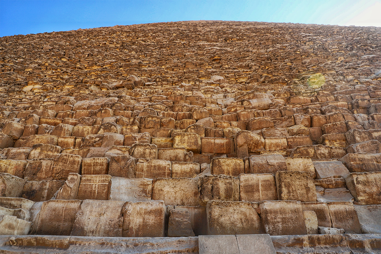 The view from the bottom of a Giza pyramid looking up the blocks to the top