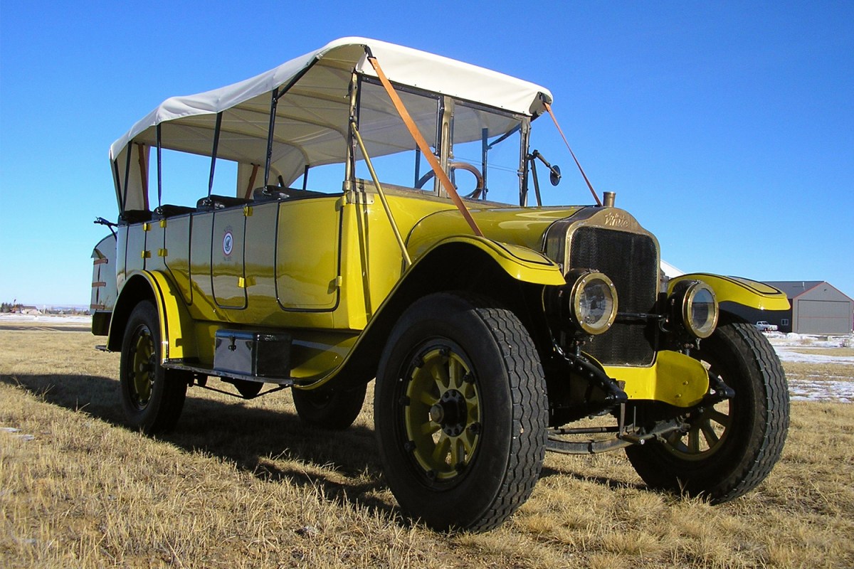 A 1925 White Model 15-45 Yellowstone National Park Tour Bus that's currently up for auction at Bring a Trailer