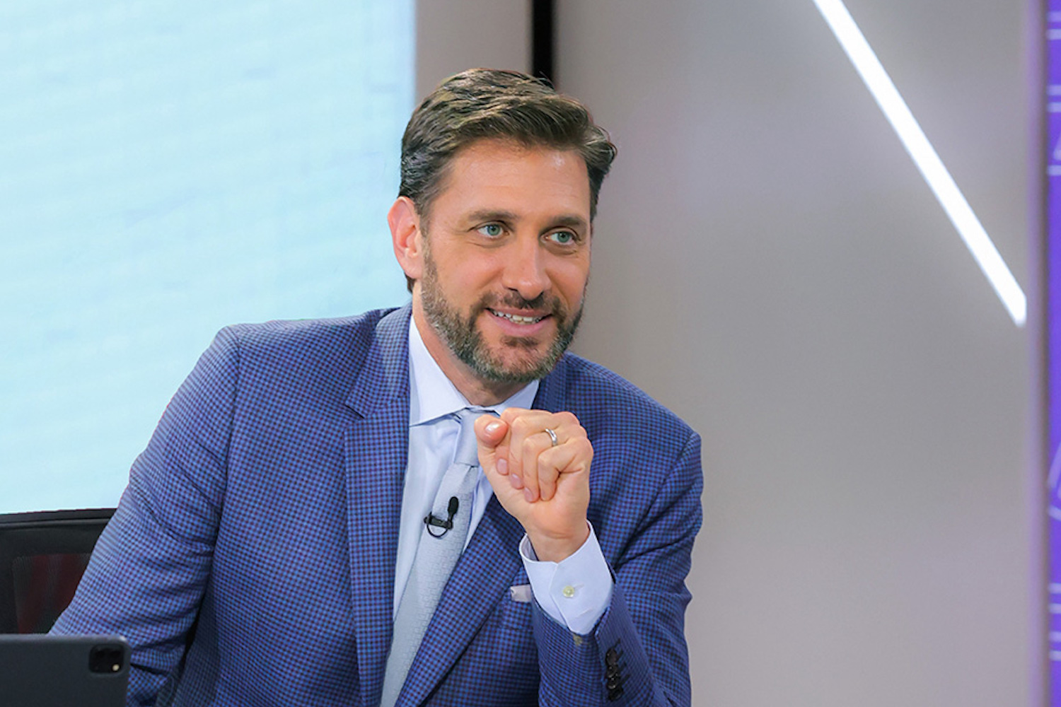 Mike Greenberg on a TV show set