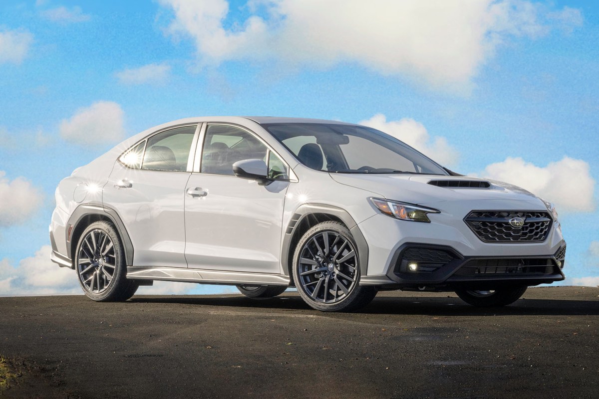 A white 2023 Subaru WRX. We tested and reviewed the high performance sedan.