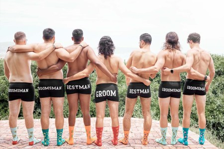A bachelor party group featuring a groom and groomsman wearing matching underwear