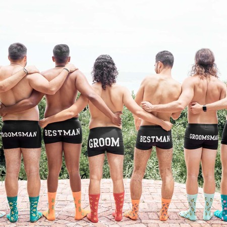A bachelor party group featuring a groom and groomsman wearing matching underwear