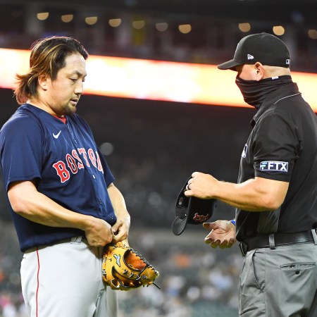 Boston Red Sox relief pitcher Hirokazu Sawamura (19) is checked for sticky substances by the umpire following the sixth inning during the Detroit Tigers versus the Boston Red Sox game on Wednesday August 4, 2021 at Comerica Park in Detroit, MI. (Photo by Steven King/Icon Sportswire via Getty Images)