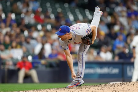 Max Scherzer of the New York Mets finishes his pitching delivery during an MLB game