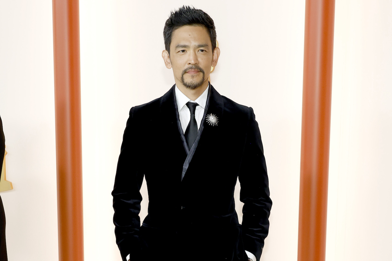a photo fo John Cho at the 95th Academy Awards