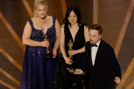 Annemarie Bradley-Sherron, Judy Chin and Adrien Morot accept the Best Makeup and Hairstyling award for "The Whale" onstage during the 95th Annual Academy Awards.