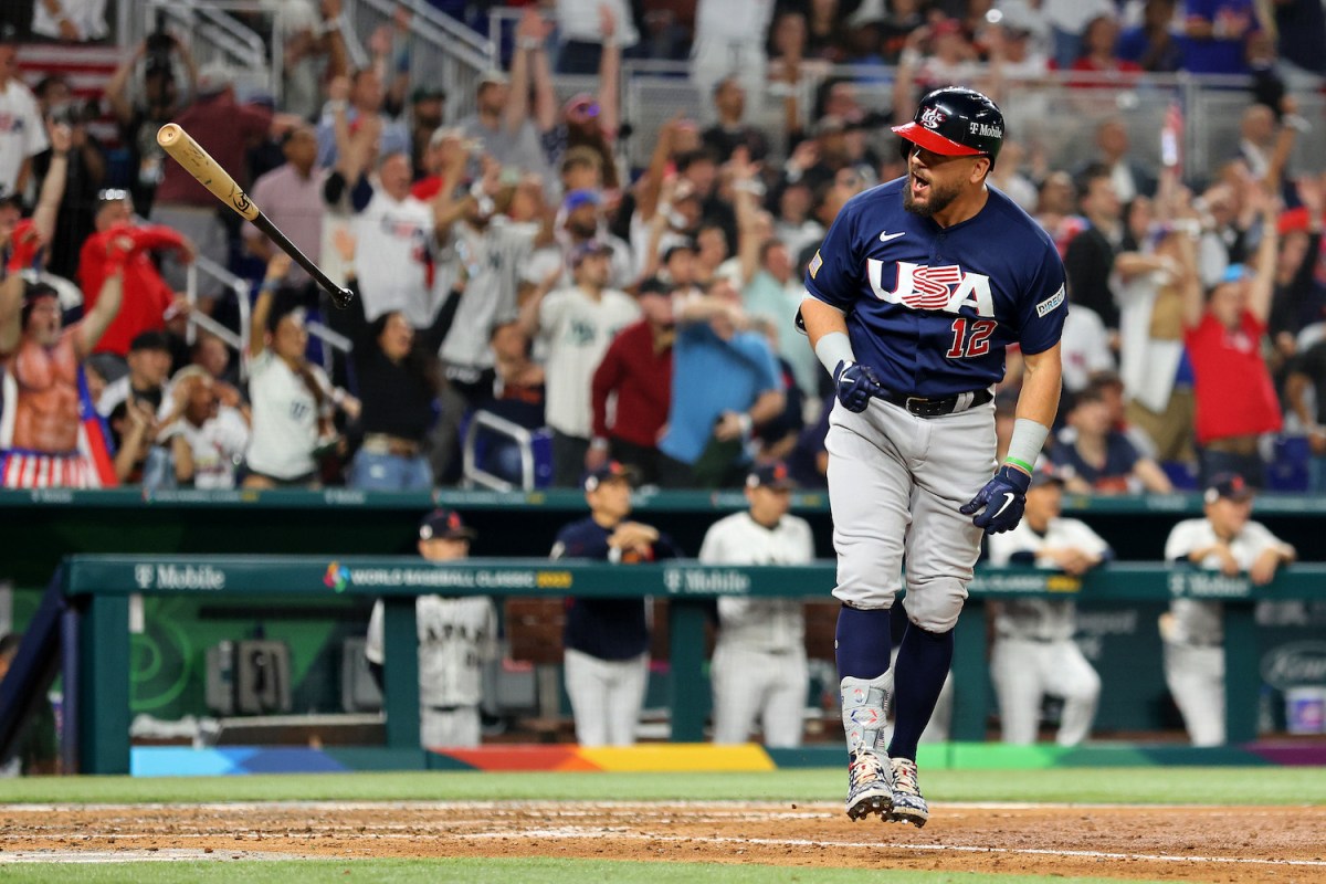 Kyle Schwarber #12 of Team USA reacts after hitting a solo home run in the eighth inning against Team Japan during the World Baseball Classic Championship at loanDepot park on March 21, 2023 in Miami, Florida.