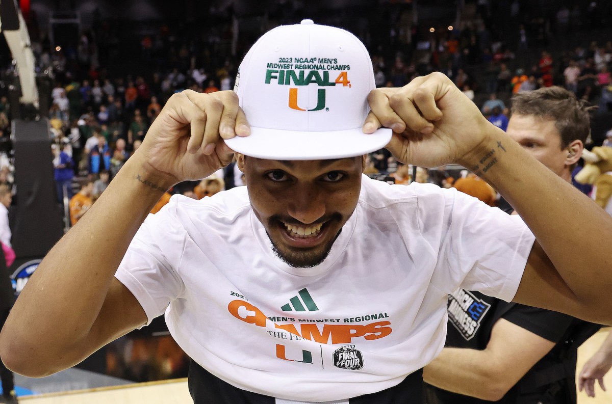 Harlond Beverly #5 of the Miami Hurricanes celebrates after defeating the Texas Longhorns 88-81 in the Elite Eight round of the NCAA Men's Basketball Tournament at T-Mobile Center on March 26, 2023 in Kansas City, Missouri.