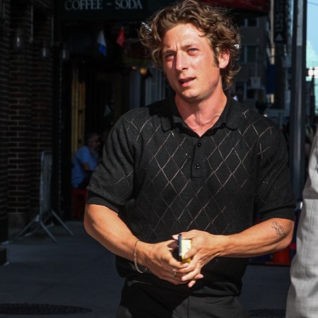 Jeremy Allen White wearing a knit polo. We rounded up the best knit polos for men to copy the style for yourself.