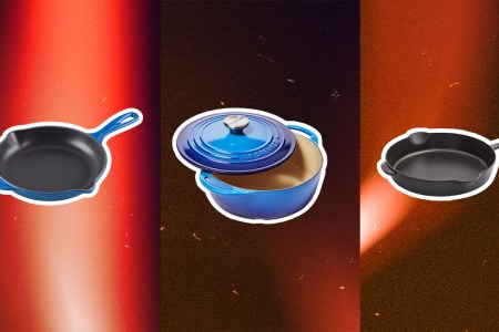 A series of pans, skillets and pots on a red abstract background