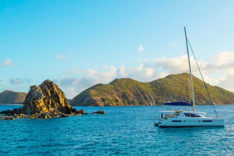 Catamaran anchored in front of Sandy Spit in the British Virgin Islands