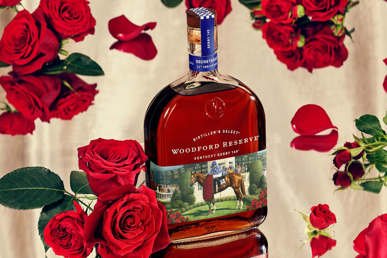 a photo of thew new Woodford Reserve bottle against a flower background