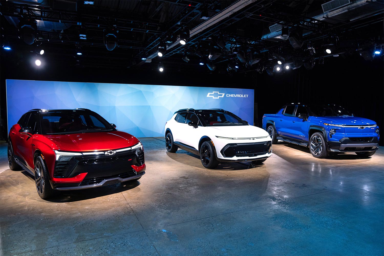 The Chevrolet Blazer EV, Equinox EV and Silverado EV in red, white and blue