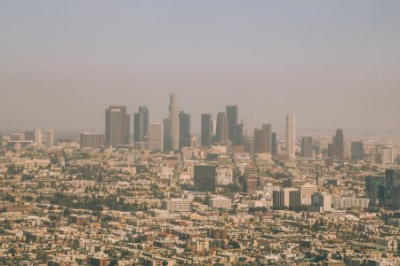 Smog hovering over downtown Los Angeles. A new air pollution study shows only a tiny percentage of the global population is free from harmful fine particulate matter.