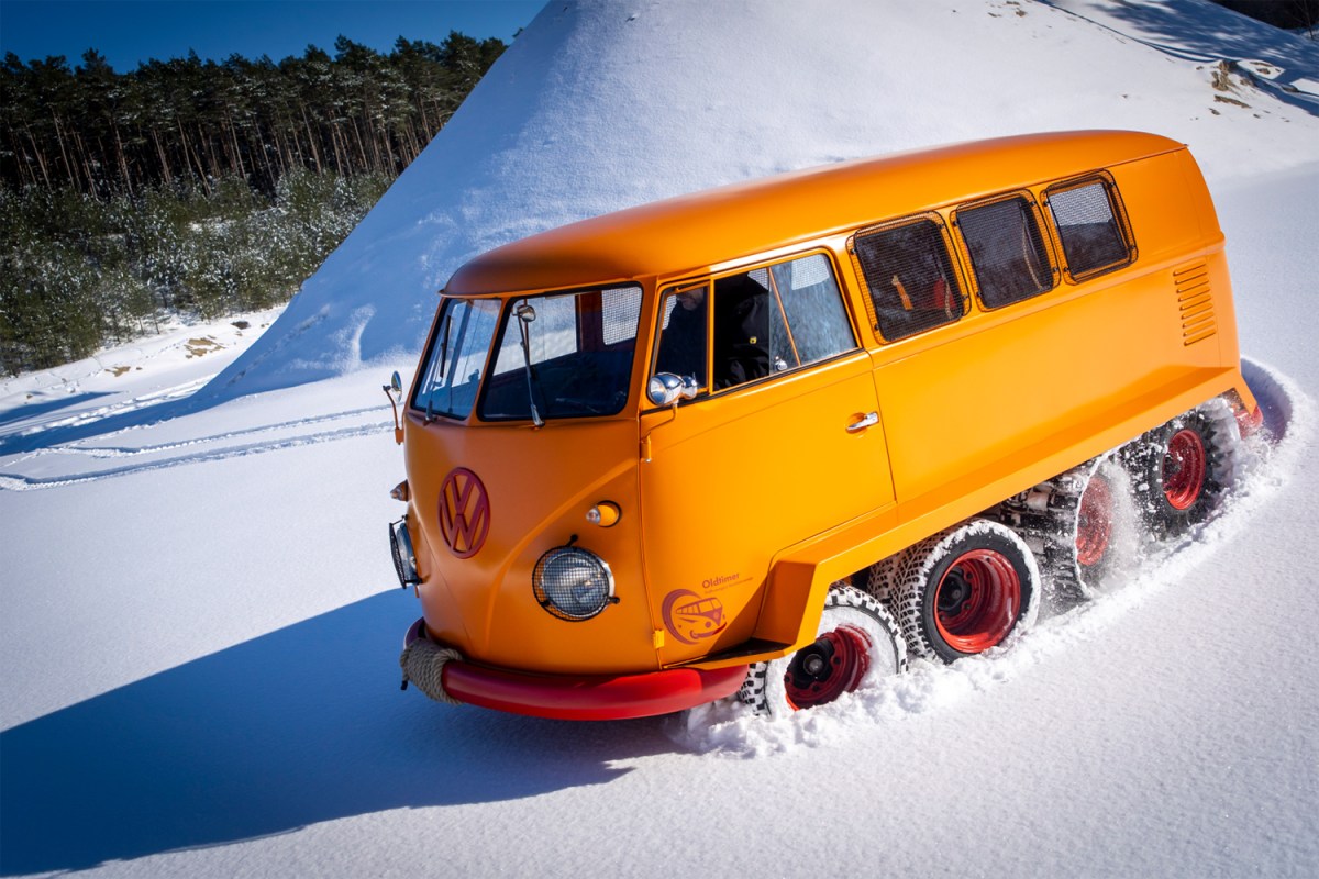 The orange Volkswagen Half-Track Fox, a 1962 Volkswagen Type 2 Transporter that was built with tracks to tackle snow on mountains in Austria