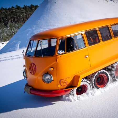 The orange Volkswagen Half-Track Fox, a 1962 Volkswagen Type 2 Transporter that was built with tracks to tackle snow on mountains in Austria