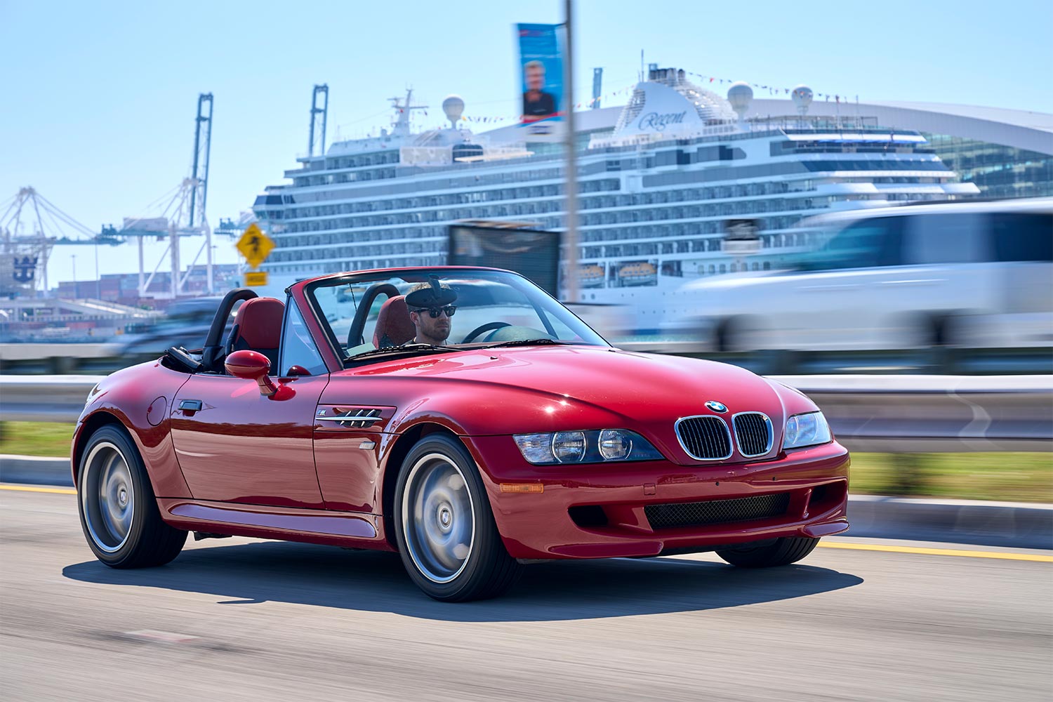 A red 2002 BMW Z3 M Roadster driving in Florida