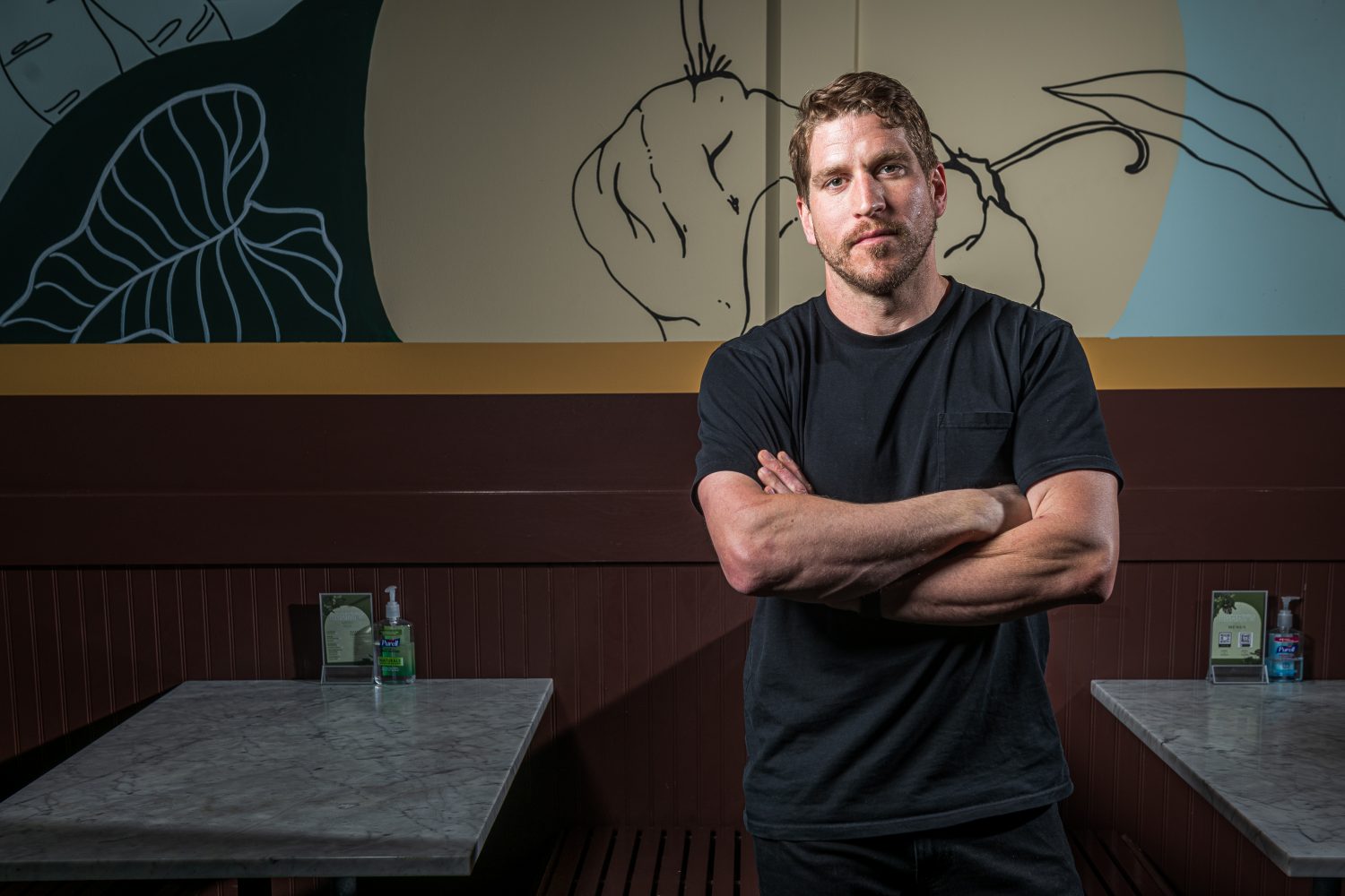 Chris Morgan of Pizza Serata standing with his arms folded.