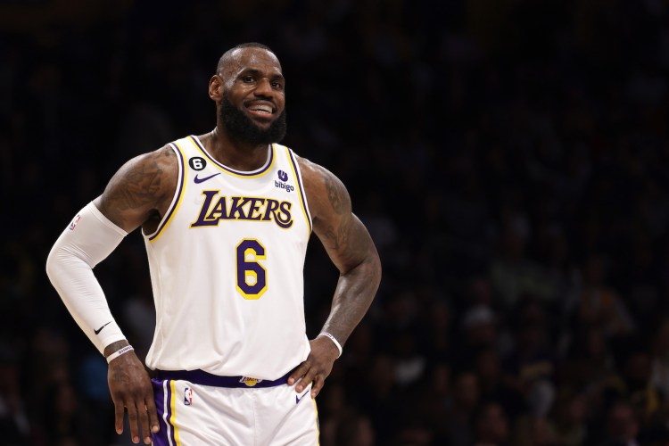 LeBron James #6 of the Los Angeles Lakers laughs on the court during the first half against the Utah Jazz at Crypto.com Arena on April 09, 2023 in Los Angeles, California.