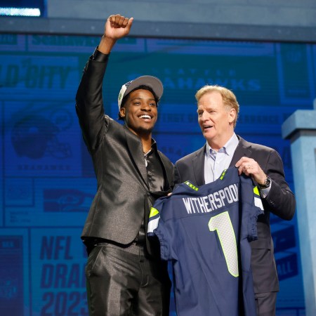 Devon Witherspoon poses with NFL Commissioner Roger Goodell after being selected fifth overall by the Seattle Seahawks during the first round of the 2023 NFL Draft at Union Station on April 27, 2023 in Kansas City, Missouri.