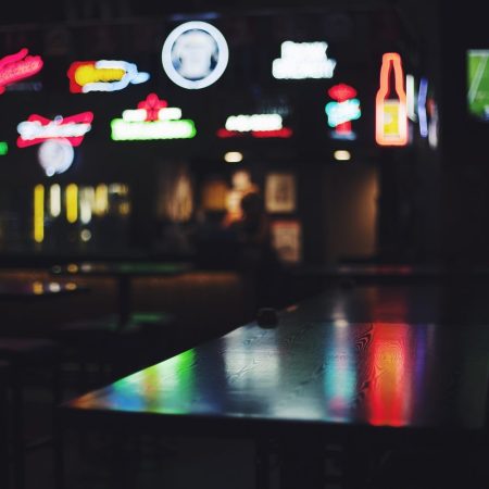 Illuminated Neon Signs In Nightclub