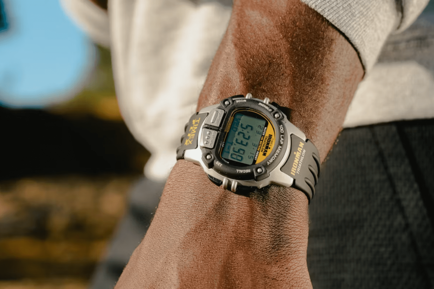 a model wearing the Huckberry x Timex Ironman Flix Reissue watch