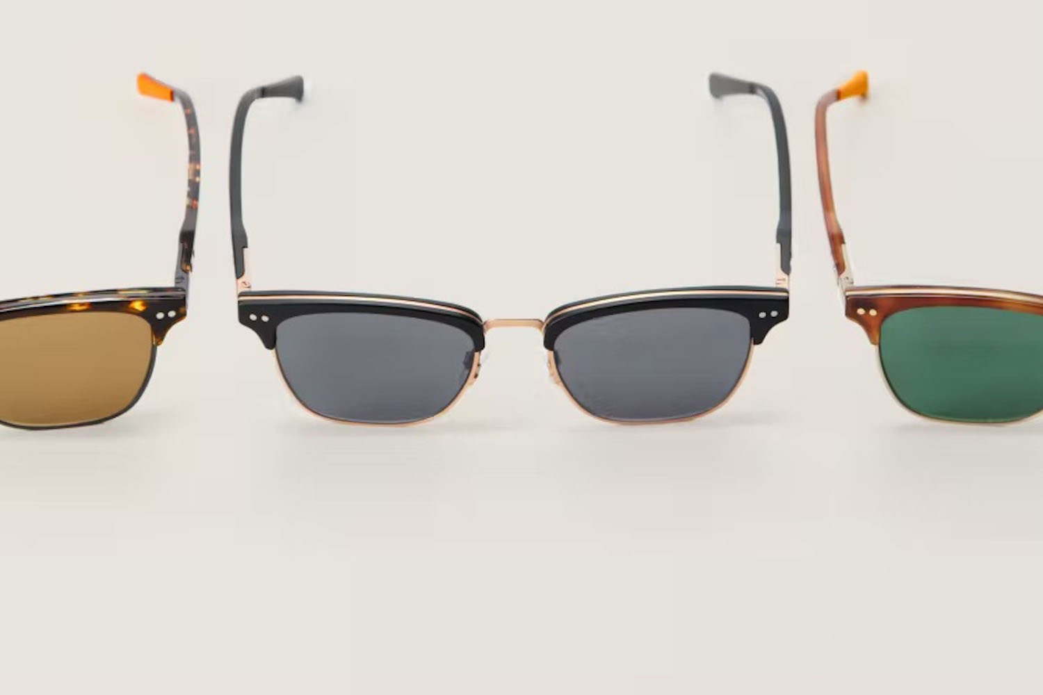 a collage of three sunglasses from shinola on a grey background