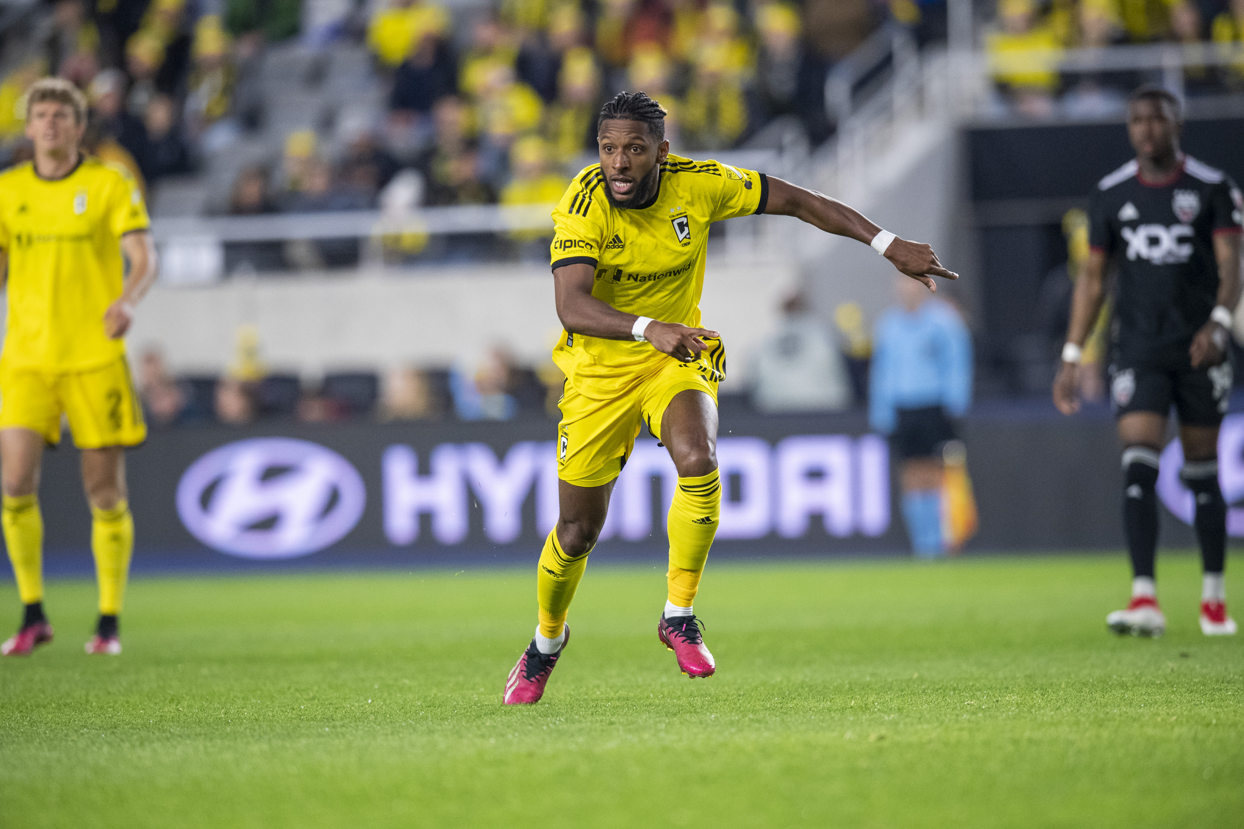 Steven Moreira of the Columbus Crew running across the pitch