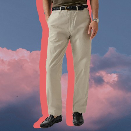 a model in a pair of travel pants on a cloud background
