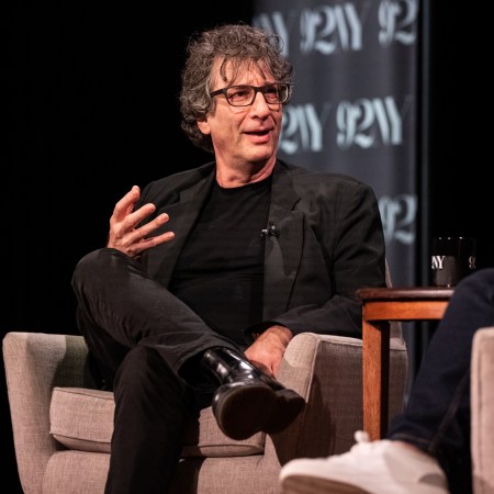 Neil Gaiman on stage at a talk in New York City.
