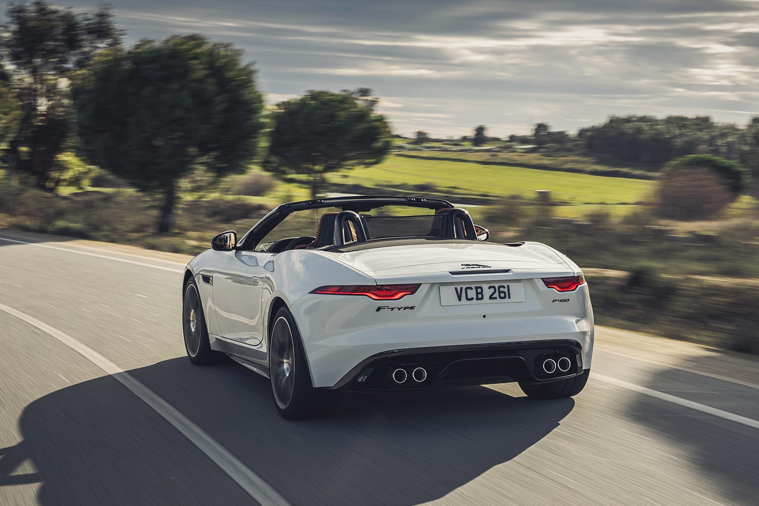 The rear end of the Jaguar F-Type Convertible as it drives down the road