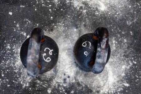 Two kettlebells on the floor.