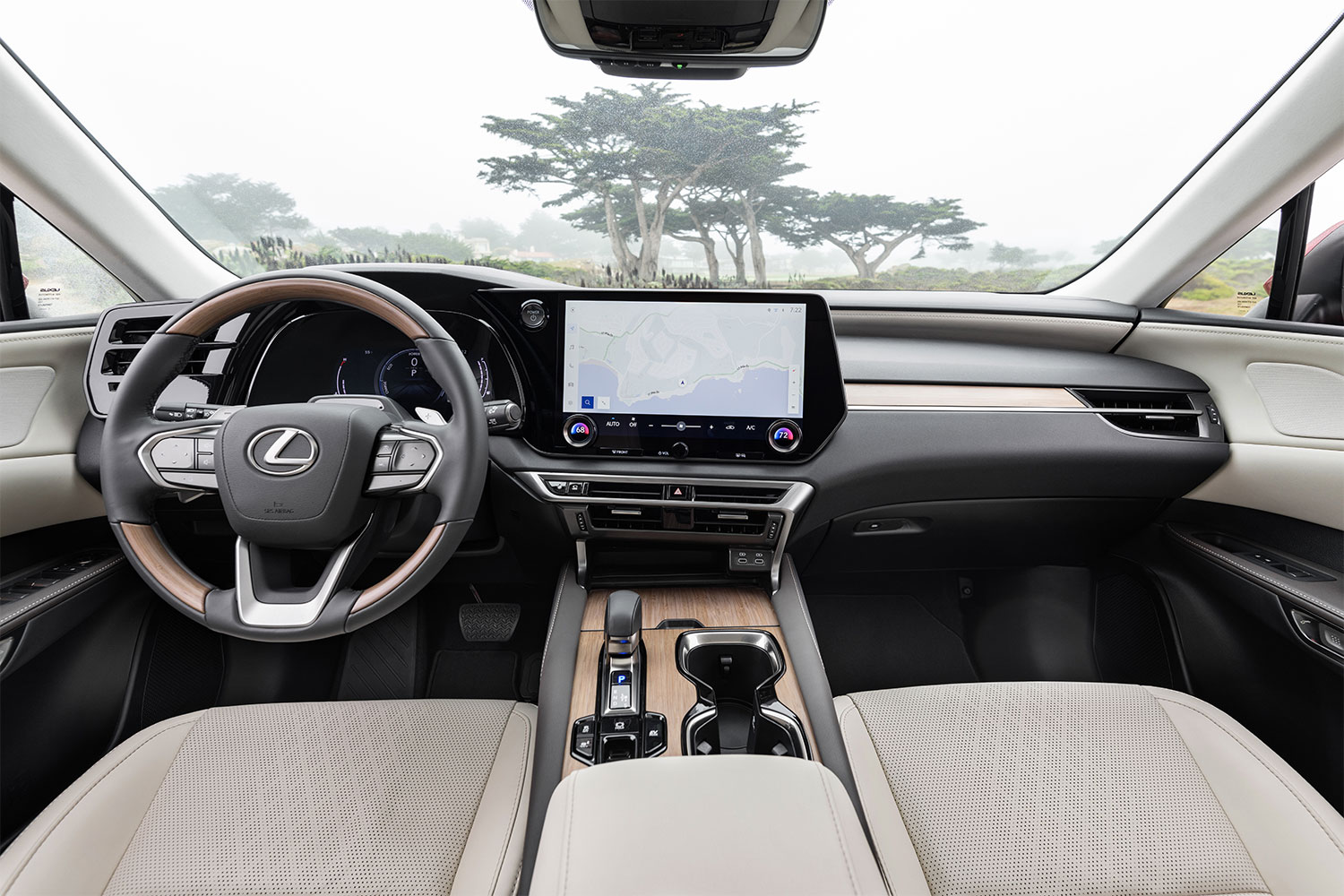 The dashboard and infotainment system on the 2023 Lexus RX 350h hybrid SUV