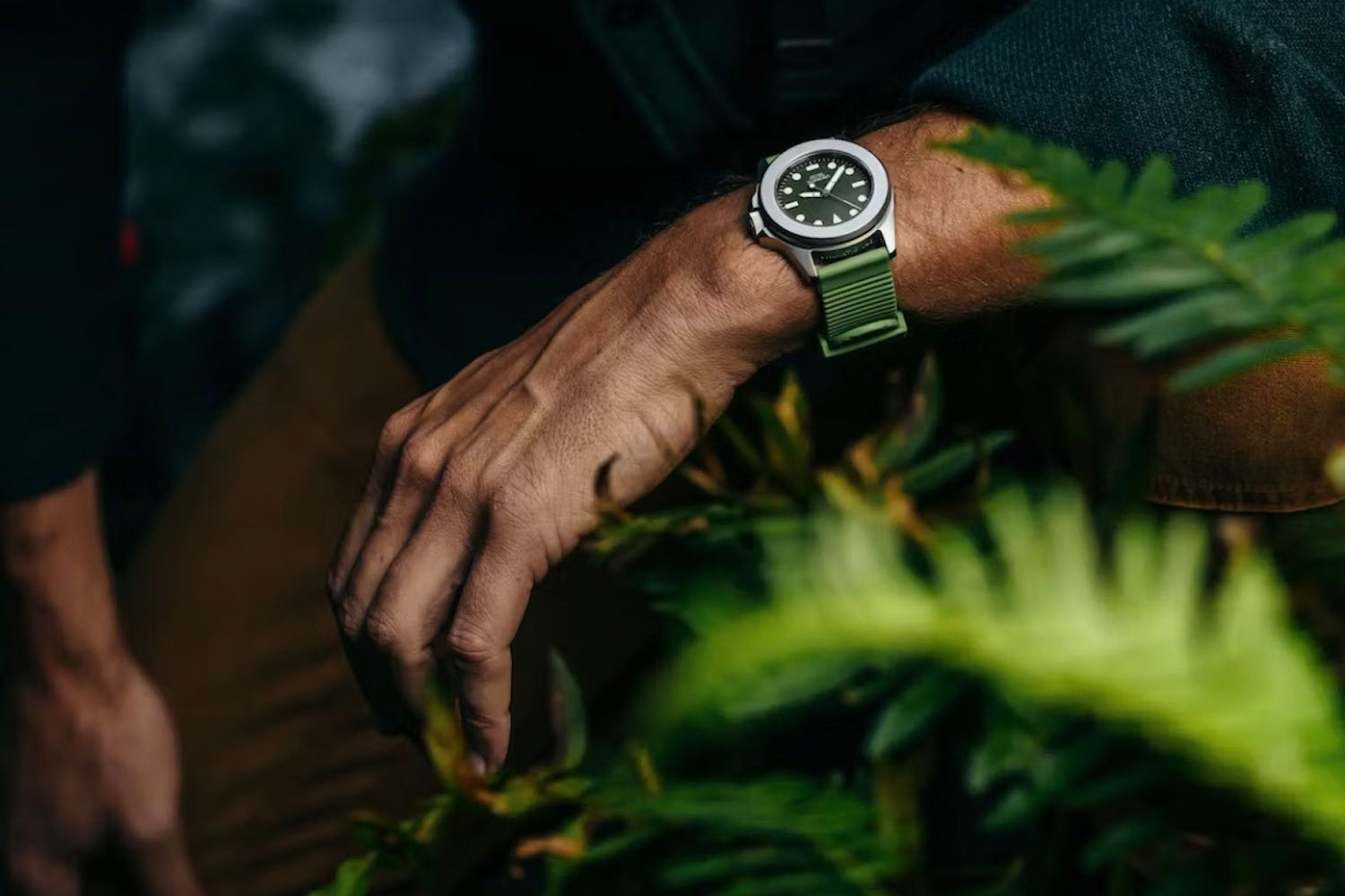 a model wearing the Huckberry x Unimatic Watch