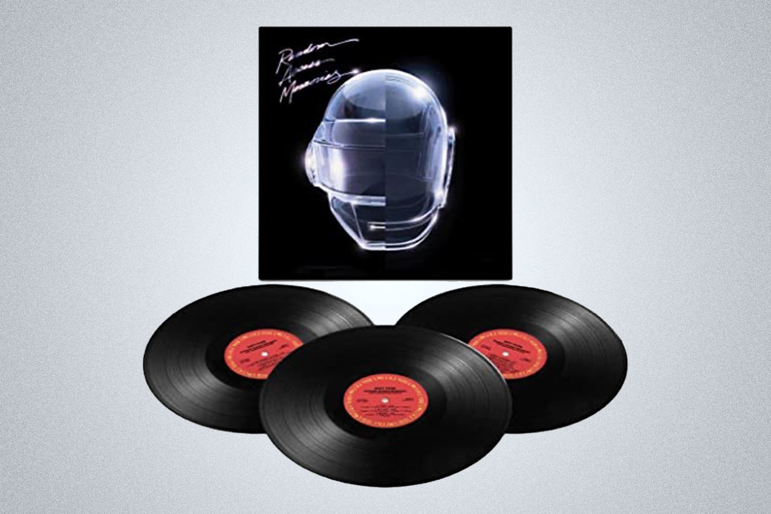 a vinyl and discs of Random Access Memories (10th Anniversary) on a grey background
