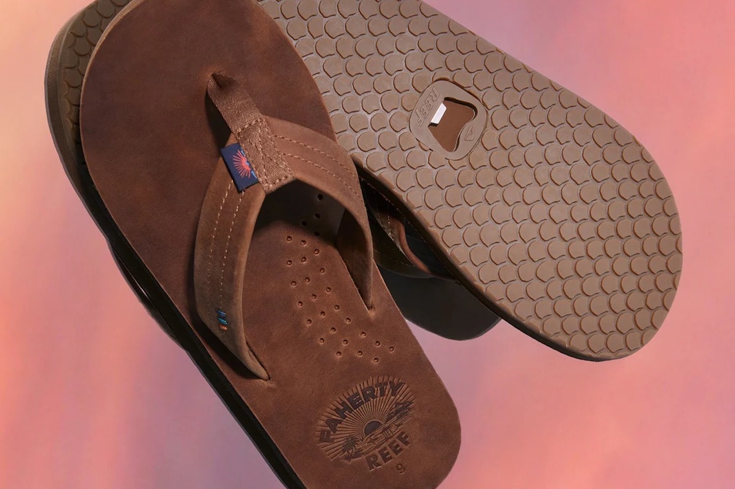 a pair of Reef x Faherty flip flops on a pink background