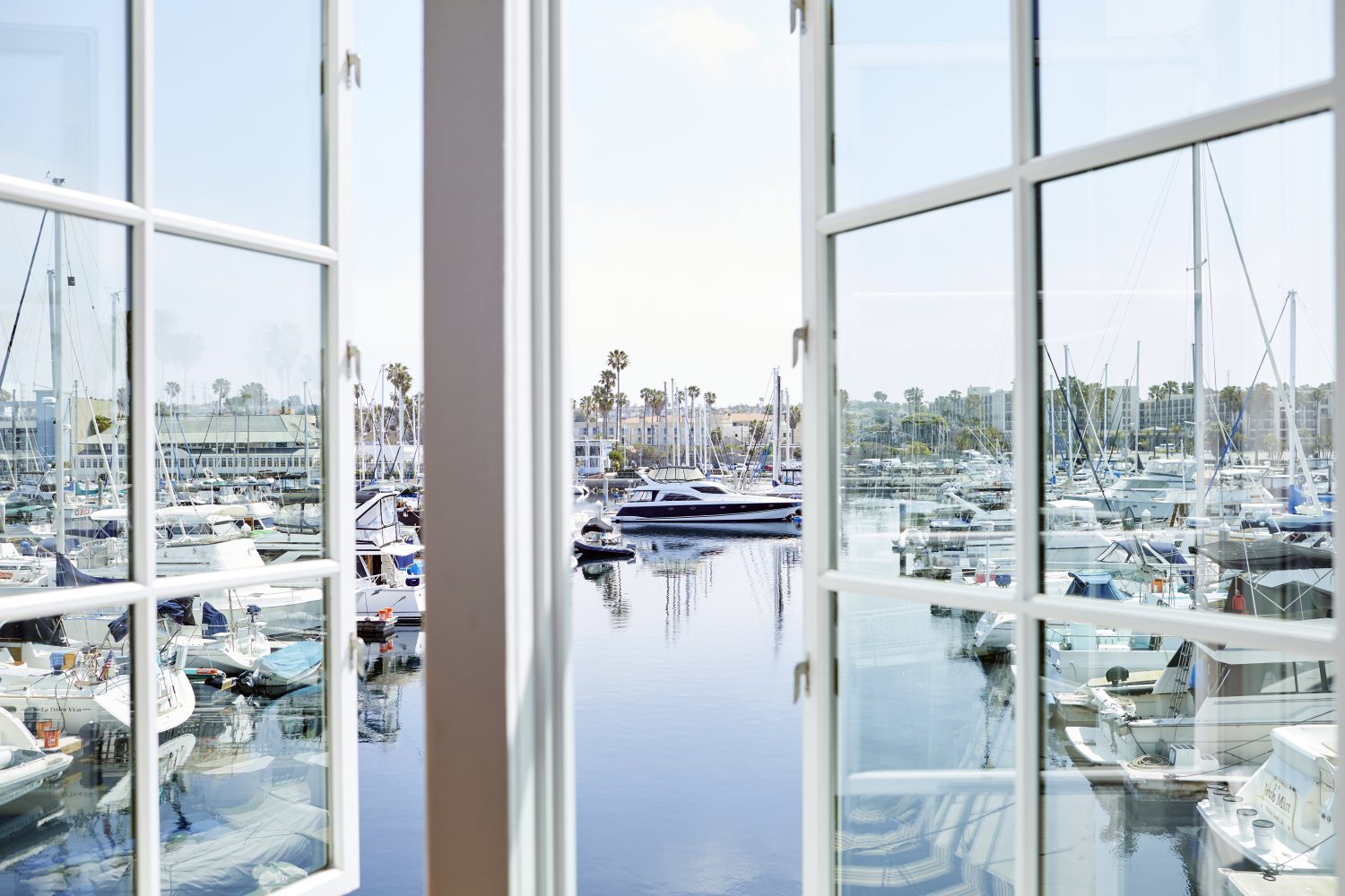 window view overlooking water and boats