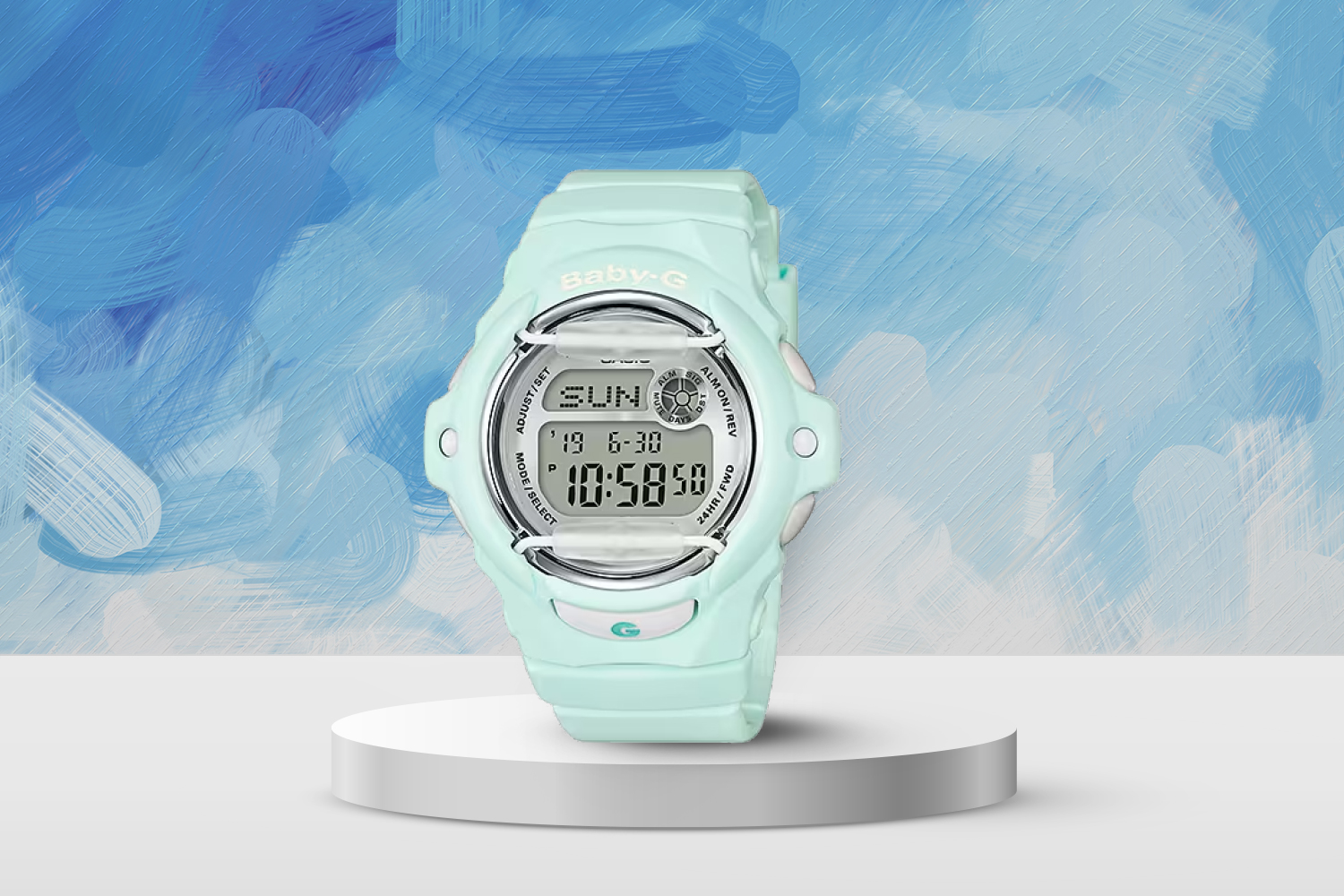 teal colored watch with white face
