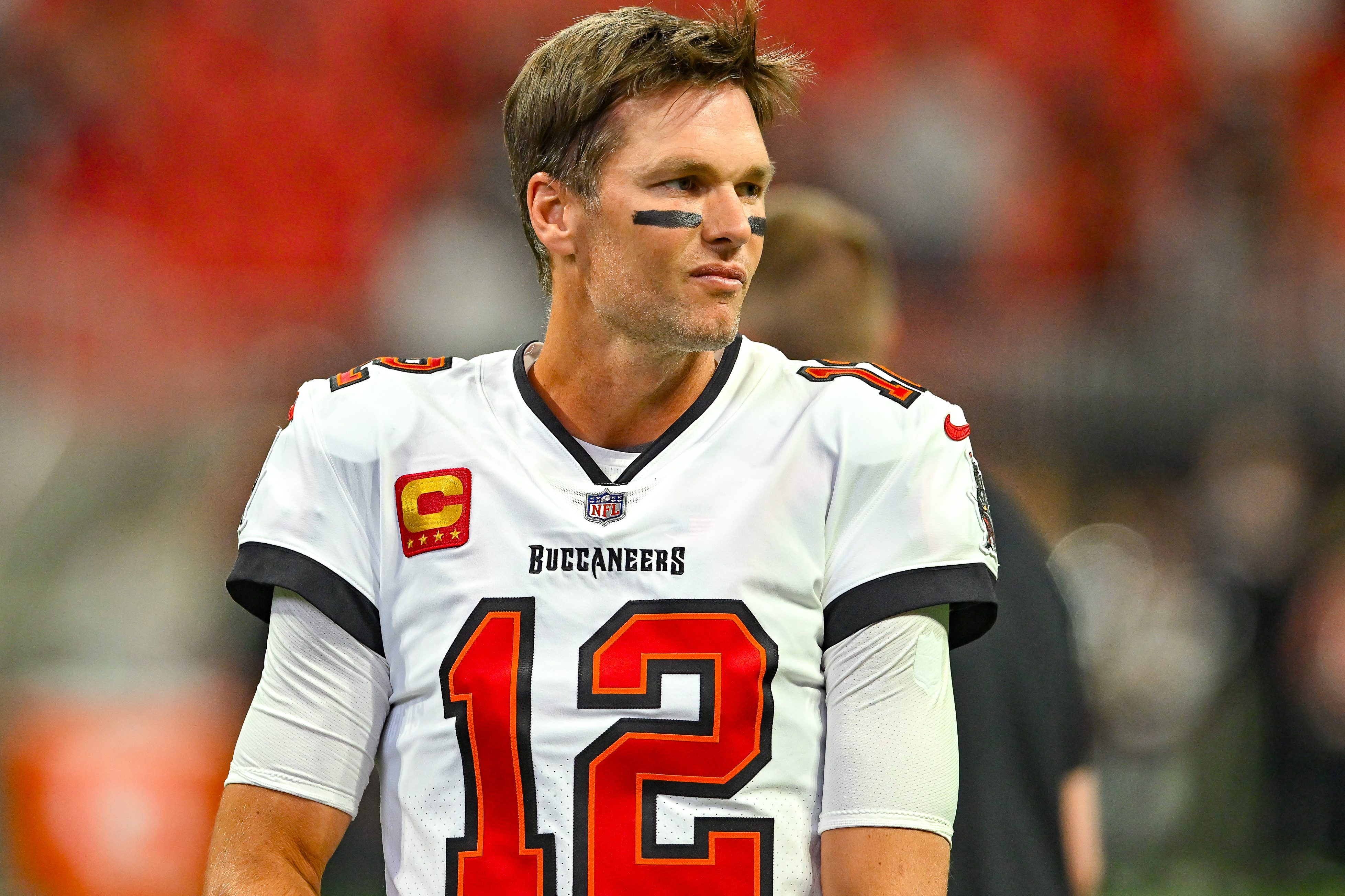 Tom Brady warms up prior to the start of an NFL game.