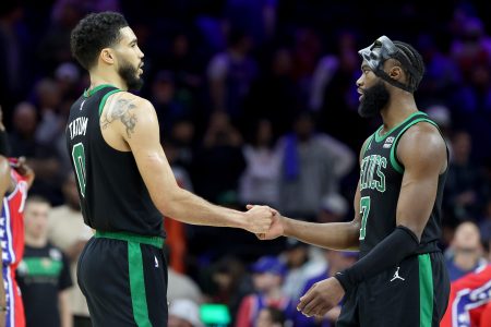 Jayson Tatum and Jaylen Brown celebrate against the 76ers.