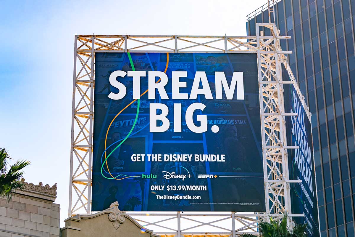 General view of a Disney streaming services billboard above the El Capitan Entertainment Centre promoting their combined content of Disney+, Hulu, and ESPN+ on October 01, 2021