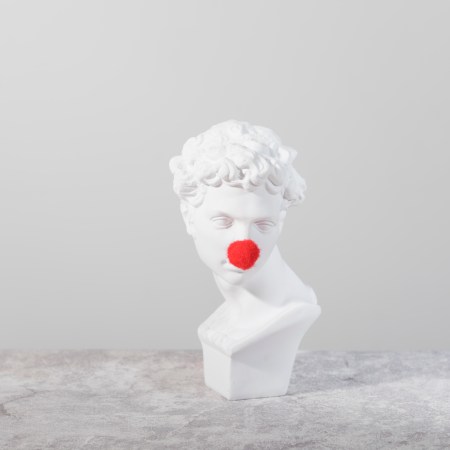A Greek bust with a clown nose.
