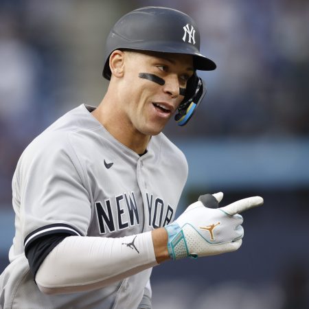 Aaron Judge of the Yankees runs out a home run against the Blue Jays.